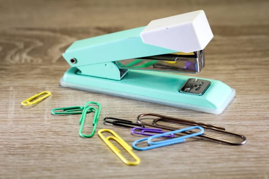 An old green tacker with spare cramps