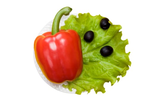 Bell pepper, olives, salad lettuce on white plate isolated on white background