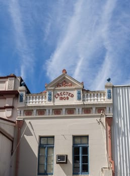Facade of a heritage building with superb architectural elements erected in 1909 in the country town of Grafton, New South Wales, Australia