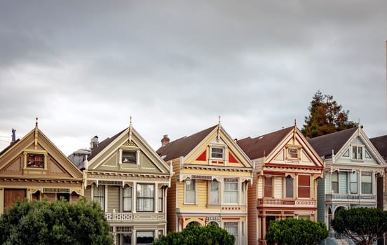 View of the famous Painted Ladies in Alamo Square in San Francisco. Victorian and Edwardian houses repainted