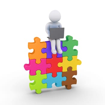 3d person with a laptop is sitting on connected puzzle pieces