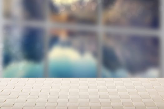 Empty table top summer background. Empty bright wooden deck table in front of blurred window abstract natural sea background. Template for your product display montage. Space.