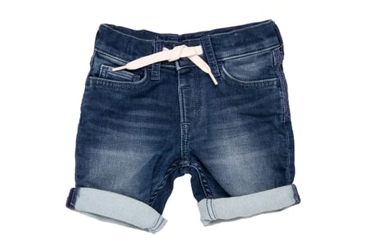Jeans shorts isolated. Trendy stylish short jeans pants with white ribbon for child boy isolated on a white background. Fashionable denim short pants.