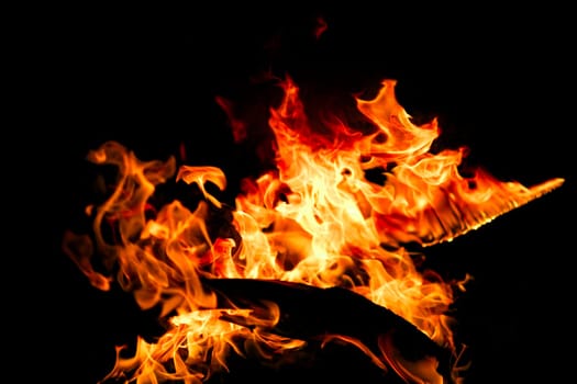 Fire flames isolated on black background