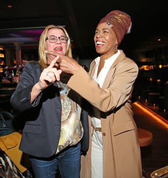 Claudia Schulz ( PR ) and  Love Newkirk,  .Pre-Easter-Drink and After Work Event  at the Tortue  in Hamburg 2019