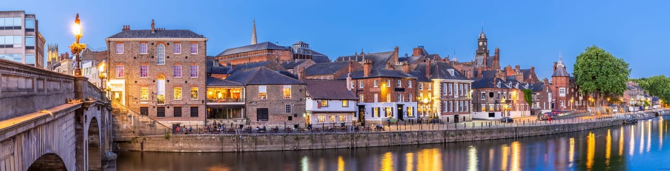 Panorama York cityscape along river ouse sunset dusk, York Yorkshire England UK.