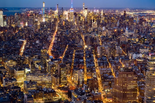 New York city Mid town Skylines cityscape from Manhattan at dusk.