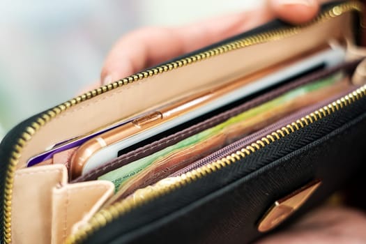Save money and account banking for finance business concept, Currency money in black bag, Savings for retirement and investing concept
