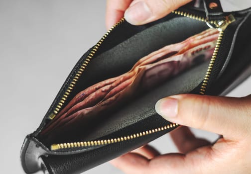 Save money and account banking for finance business concept, Currency money in black bag, Savings for retirement and investing concept