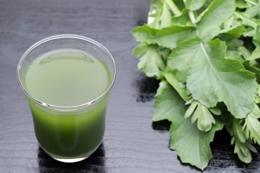 Glass of green vegetable juice, Vegetable juice called "aojiru"" in Japan"
