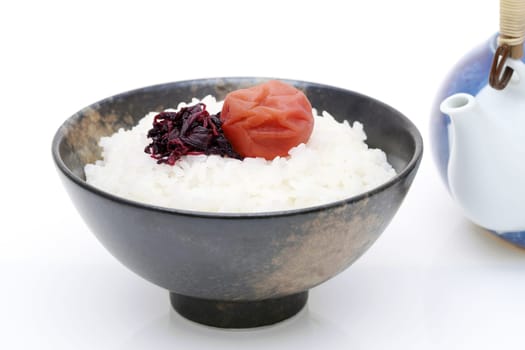 Japanese food, Rice chazuke or ochazuke with umeboshi and shiso, on white background