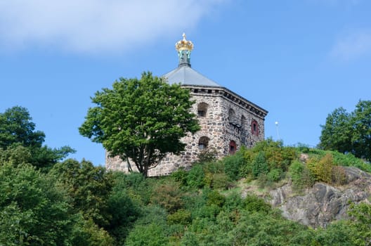 a very old castle on the top of the hill