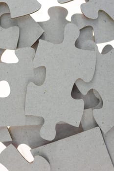 A close up shot of jigsaw pieces