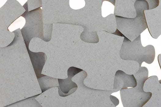A close up shot of jigsaw pieces