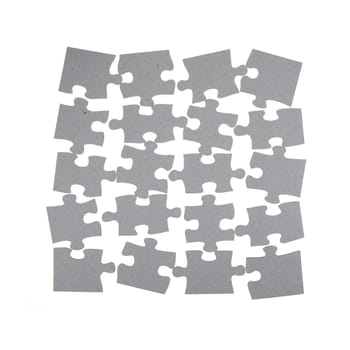 A close up shot of jigsaw pieces