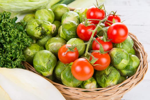 small tomatoes and brussels sprouts with parsley