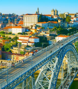 Skyline of Porto Old Town with famous Dom Luis II bridge. Portugal
