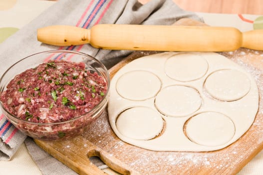 fresh raw dough and beef mince for cooking culinary products