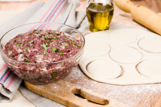 fresh raw dough and beef mince for cooking culinary products