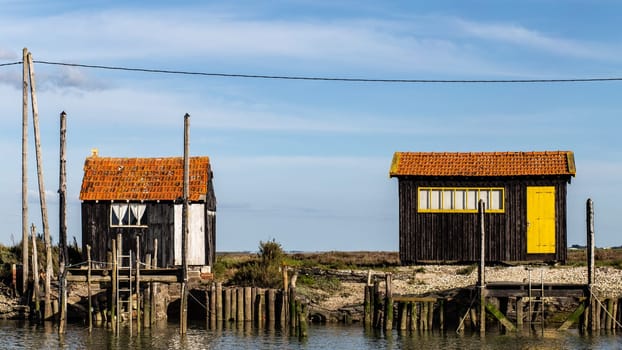 Colourful cabin of fishermen huts at La Tremblade near Oleron,Nouvelle-Aquitaine, France