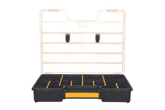 Equipment of craftsman. A empty open professional black plastic storage box for screws, bolts, dowels and some other components isolated on a white background. Handyman accessories.
