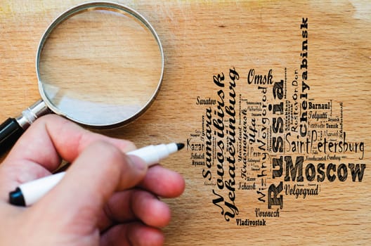 Localities in Russia word cloud travel concept over wooden background