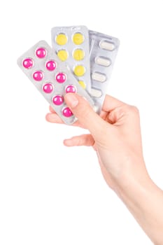 Woman hand holding pills tablet. Female hand holding prescription pill over white background.