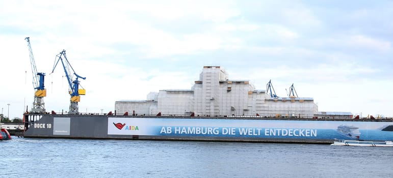 Octopus is a 414-foot (126 m) megayacht owned by the estate of the passed away  Microsoft co-founder Paul Allen is wrapped under plastic Wall for to get a secret general overhauled  in the Dock from Blohm and Voss - Port Hamburg on 05.05.2019