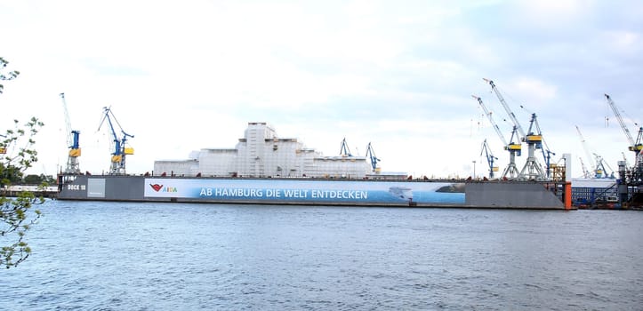 Octopus is a 414-foot (126 m) megayacht owned by the estate of the passed away  Microsoft co-founder Paul Allen is wrapped under plastic Wall for to get a secret general overhauled  in the Dock from Blohm and Voss - Port Hamburg on 05.05.2019