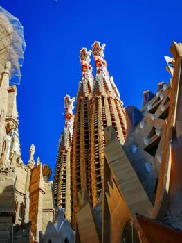 Barcelona, Spain, April 2019: detail of the towers of the famous Sagrada Familia church in Barcelona designed by architect Antoni Gaudí