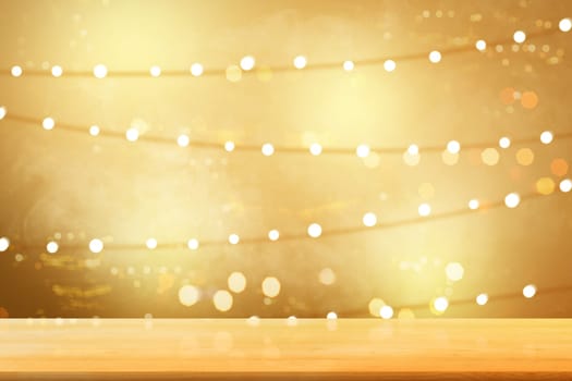 Wooden table with blurry lights over bright background