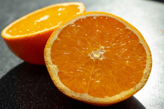 two halves of a ripe juicy orange