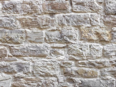 Texture of wall. Old wall made from bumpy stones.