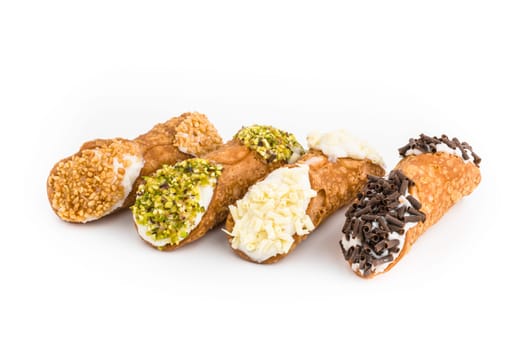 Variegated Sicilian Cannoli, Italian Dessert, isolated on a white background.