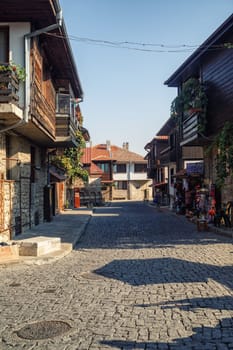 Nesebar, Bulgaria - September 10, 2014: Typical street in old town of Nessebar, Bulgaria. Bulgarian Black Sea Coast. UNESCO world heritage site. Vertical shot.