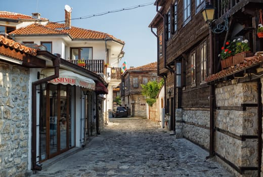Nesebar, Bulgaria - September 10, 2014: Typical architecture and cobbled stone pavement in old town of Nessebar. UNESCO world heritage site.