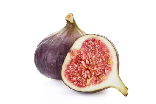 Fresh ripe sweet figs on a white background.