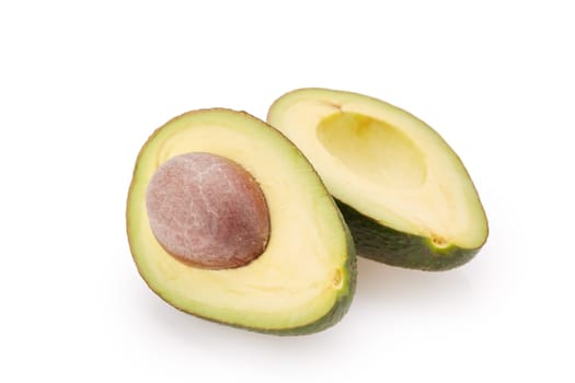 Fresh avocado fruits on a white background.