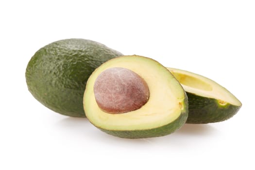 Fresh avocado fruits on a white background.