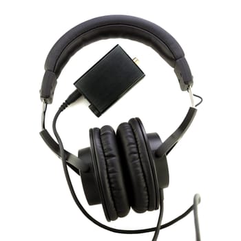 professional studio headphones and digital analog converter or DAC on white background