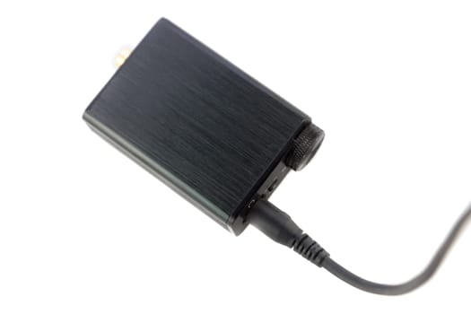 digital to analog converter or headphone amplifier on white background