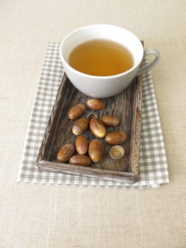 Acorn coffee from roasted acorns on a tray