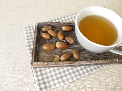 Acorn coffee from roasted acorns on a tray