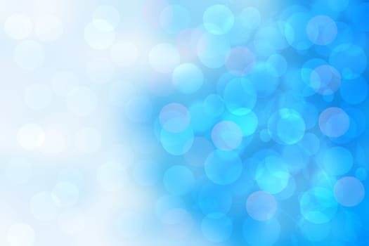 Abstract gradient of light blue white pastel background texture with glowing circular bokeh lights. Beautiful colorful spring or summer backdrop. Space.