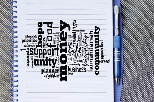 Money word cloud business concept over notepad background..
