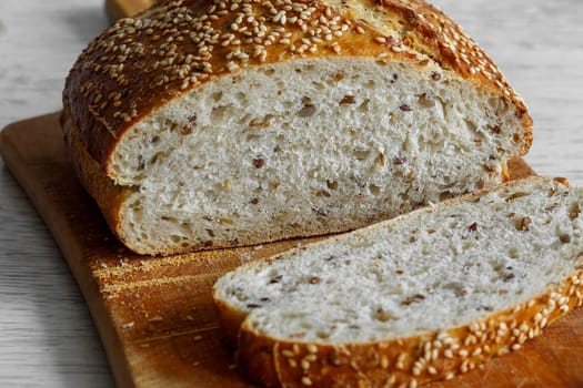 Bread with sunflower seed cutting board, slice on bread