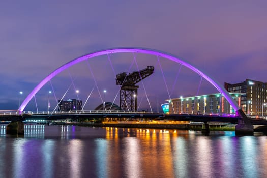 Clyde Arc Bridge along River Clyde Sunset twilight at Glasgow city Scotland UK.