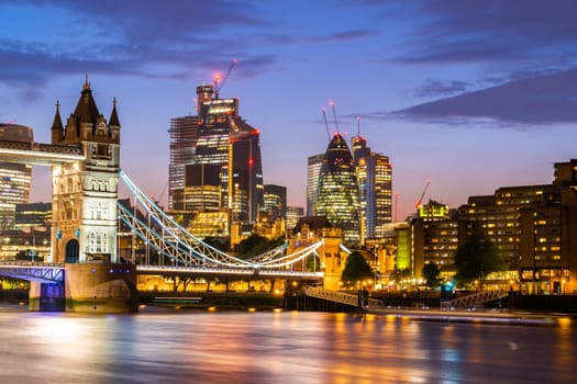 London Tower Bridge with London downtown skylines building in background, London UK.