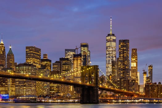 Brooklyn bridge with Lower Manhattan skyscrapers bulding for New York City in New York State NY , USA