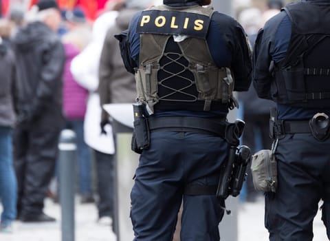Swedish Police Officer with gun.